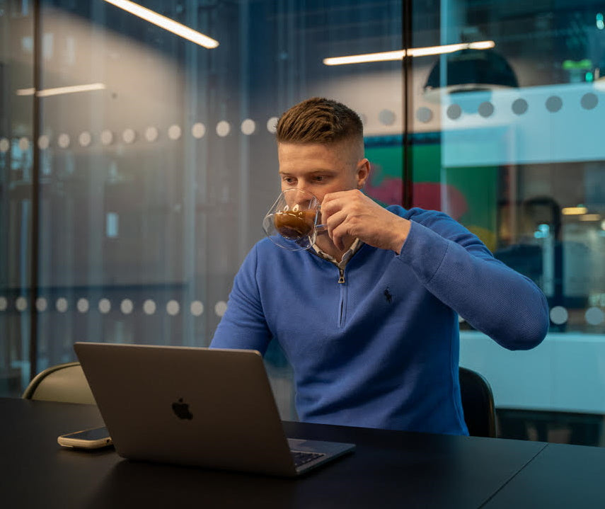 drinking high performance coffee when working in the office